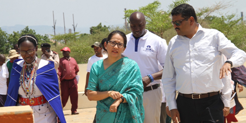 The Chief Guest Her Excellency Madam Namgya C. Khampa, Indian High Commissioner to Kenya (centre), together with Teriano Saidimu (left), a PhD student at the University of Toronto, Dr. Stephen Moiko, Chairman of the Education Committee and CEO Subodh Srivastav (right), during the occasion